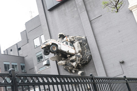 30627435 - a decorative car crashed into the building