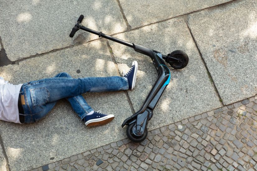Unconscious Man Lying On Street After Accident Electric Scooter